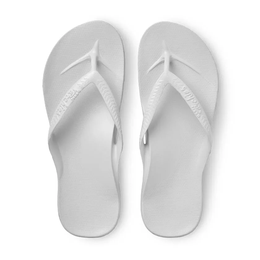 Arch support flip flops in white